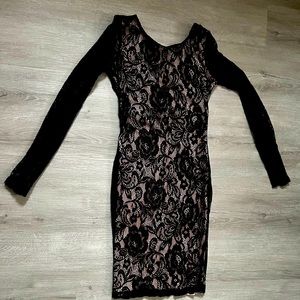 Justfab sexy black lace dress. Bow-shaped back for edgy look. Small size